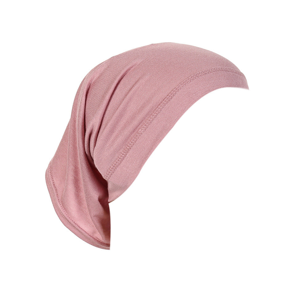 Pink headscarf on a white background